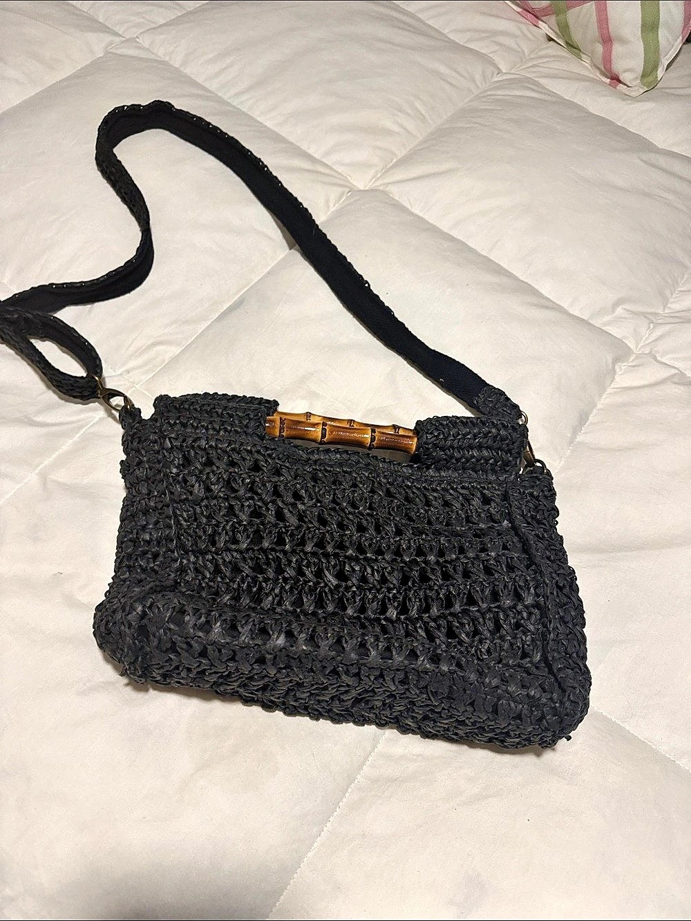 Black Shoulder Bag with Bamboo-Style Handles little pocket inside is tiered , do